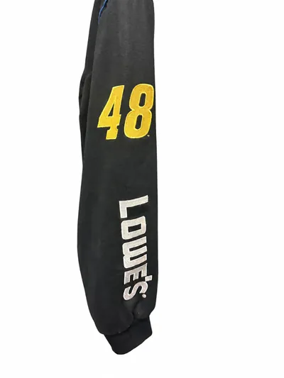 The other sleeve, with a yellow number 48 above white Lowe's lettering.