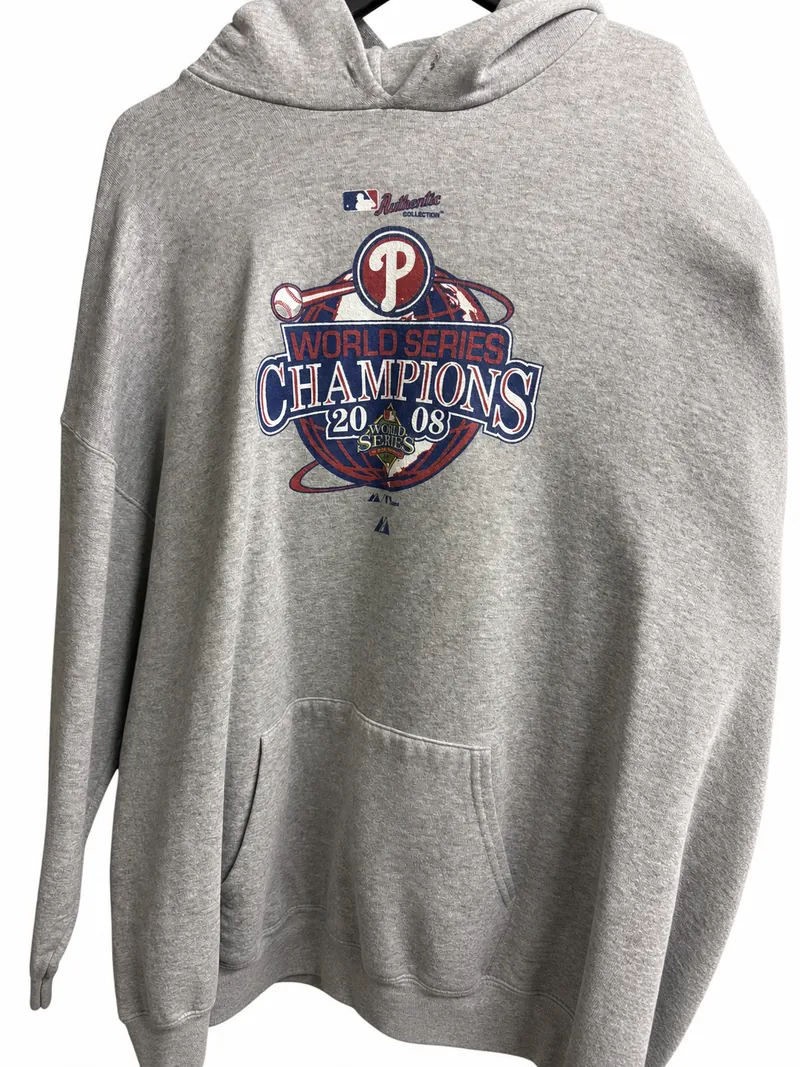 The front of the gray Phillies hoodie, with a red, navy and white 2008 World Series Champions graphic above the pocket.